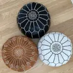 Moroccan handmade poufs in brown, black and white with pattern
