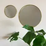 Round mirrors with thin gold rim in small and large sizes