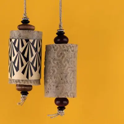 Brown L' Art du bain soap rolls that are suspended