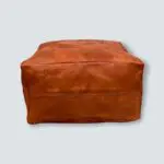 Square Moroccan hand-stitched leather pouf, from the side