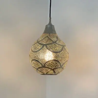 Moroccan handmade round lamp, lit in the dark