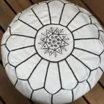 Moroccan handmade pouf in black with white pattern, close