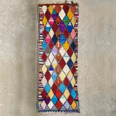 Handwoven boucherouite carpet in multi-colored diamond pattern, dense