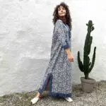 Model in Moroccan handwoven denim dress with leaf pattern