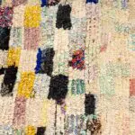 Moroccan handwoven Boucherouite carpet in multi-colored pattern, dense