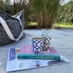 Your guide to Marrakech book with ceramic mug on top, on top of a rug
