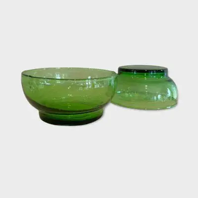 The top and bottom of large handmade green beldi glass bowls
