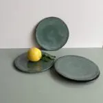 Moroccan handmade stoneware plates in green marbre, with decorations on