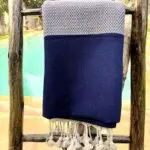 Moroccan handwoven hammam towel in blue with white Moroccan pattern