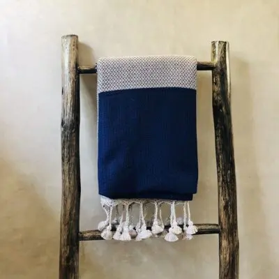 Moroccan handwoven hammam towel in blue with white pattern