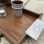 Moroccan handmade tray in walnut wood with inox service handle on top