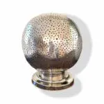 Moroccan handmade table lamp in silver metal with single hole pattern, off, close
