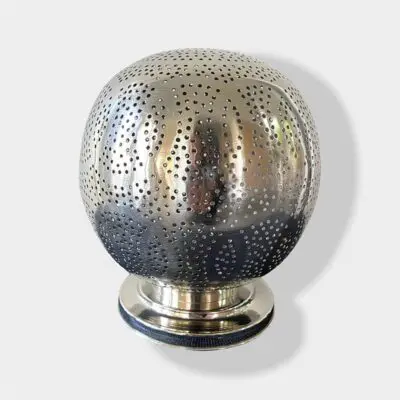 Moroccan handmade table lamp in silver metal with compound rings pattern, switched off