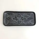 Black handmade dish with white Moroccan pattern