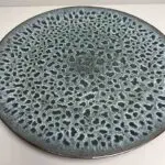 Moroccan handmade stoneware plate in green with leopard spot pattern