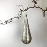 Moroccan handmade drop-shaped lamp, hanging on a branch