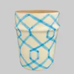 Moroccan handmade mug in beige with light blue stripe pattern