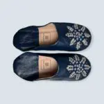 Moroccan handmade slippers in midnight blue, with sequins on, from the side