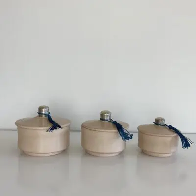 Beige round low Moroccan handmade stucco jars with blue tassels