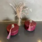 Bordeaux round low Moroccan handmade stucco jars with pink tassels
