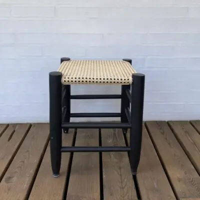 Moroccan handmade stool in black with cannage rattan seat