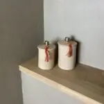 Moroccan handmade stucco jars in beige