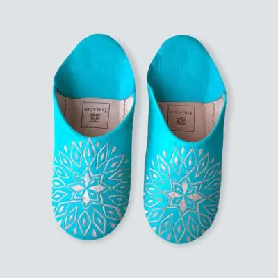 Moroccan handmade slippers in turquoise with white pattern