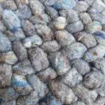 Pouf rond marocain cousu main en laine bleu pétrole, dense