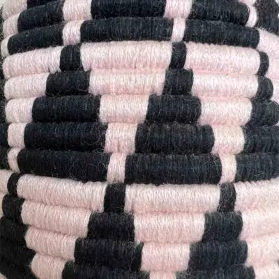 Berber basket with triangle pattern in pink and black