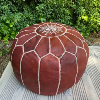 Moroccan pouf in cognac colored leather