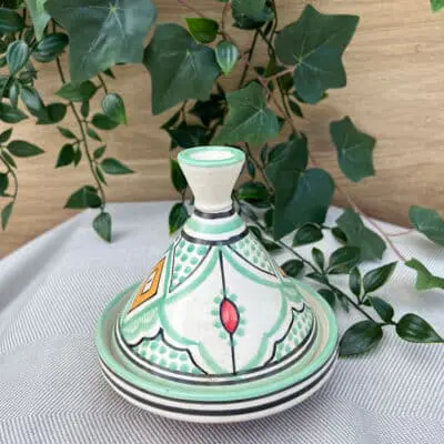 Moroccan tagine in a mint green color - measures 13 cm. displayed with the lid on