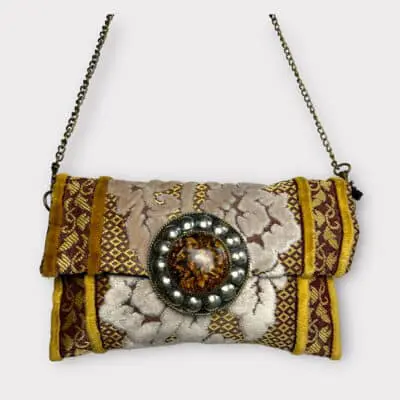Handbag in yellow and beige patterns in soft velor fabric and copper chain
