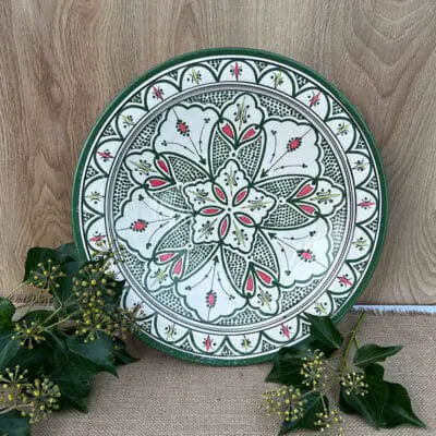 Beautiful dark green Moroccan dish with red details, handmade in Morocco. Beautiful pattern. Measures 42 cm.