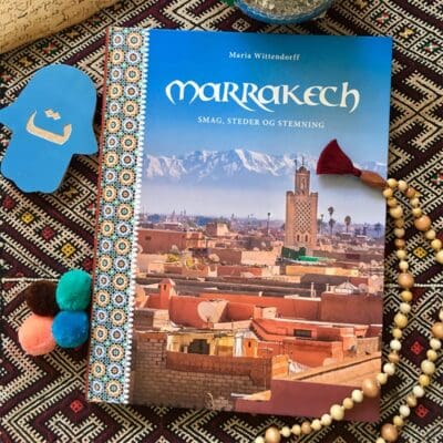 Marrakech. Smag, steder og stemning bog oven på et marokkansk tæppe