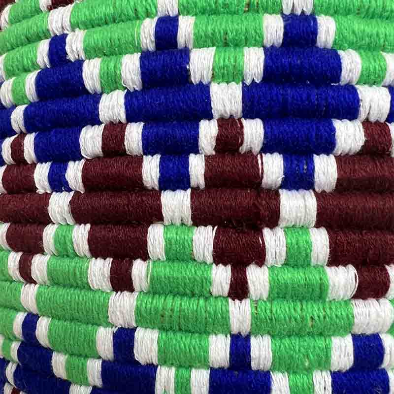 Berberkurv i grøn, blå og brunlige farver