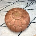 Moroccan leather pouf in a light hazelnut colour