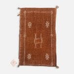 Motif 1 in earthy tones. Cactus silk pillowcase handmade in Morocco. Measures 40x60 cm.