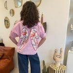 Angel blush shirt in roze met witte strepen en opgestikte engelenvleugels op de rug