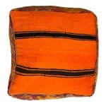 Coussin de sol _AMOUD dans les tons rouge brûlé et orange