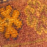 Coussin de sol _AMOUD dans les tons rouge brûlé et orange