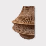 Crochet lamp rust colored in three sizes. Crocheted in nylon yarn