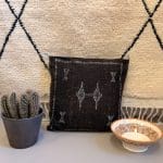 Deep mocca brown colored cactus silk pillowcases. This one with white details.