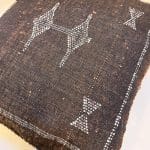 Deep mocca brown colored cactus silk pillowcases. This one with white details.