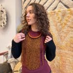 Halsband med varma orangea och svarta pärlor och orange halsring i flätat läder.