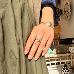 Beautiful silver ring with bright teardrop-shaped stones that sit opposite each other.