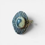 Nice ring with yin and yang in the middle. Harmonious expression.