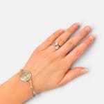 Beautiful silver ring with bright teardrop-shaped stones that sit opposite each other.