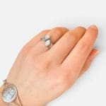 Beautiful silver ring with bright teardrop-shaped stones that sit opposite each other.