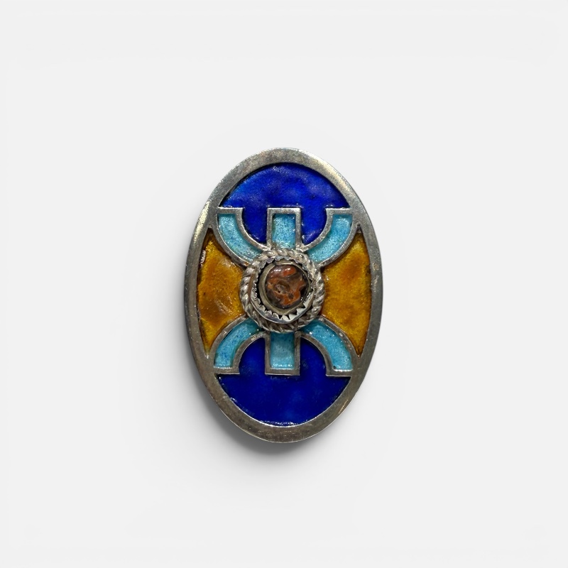 Photoroom_20260429_113540 Silver ring in blue and yellow enamel, handmade in Morocco. Reddish stone in the center.