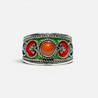 Beautiful silver ring in enamel in green, red, orange and blue colors. Reddish orange stone in the center.